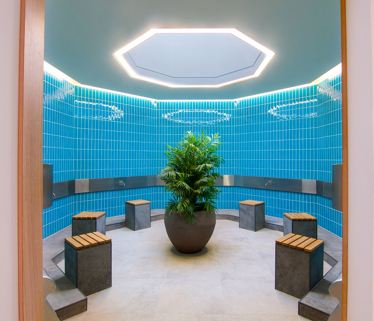 Girl sitting in her tent with a coffee