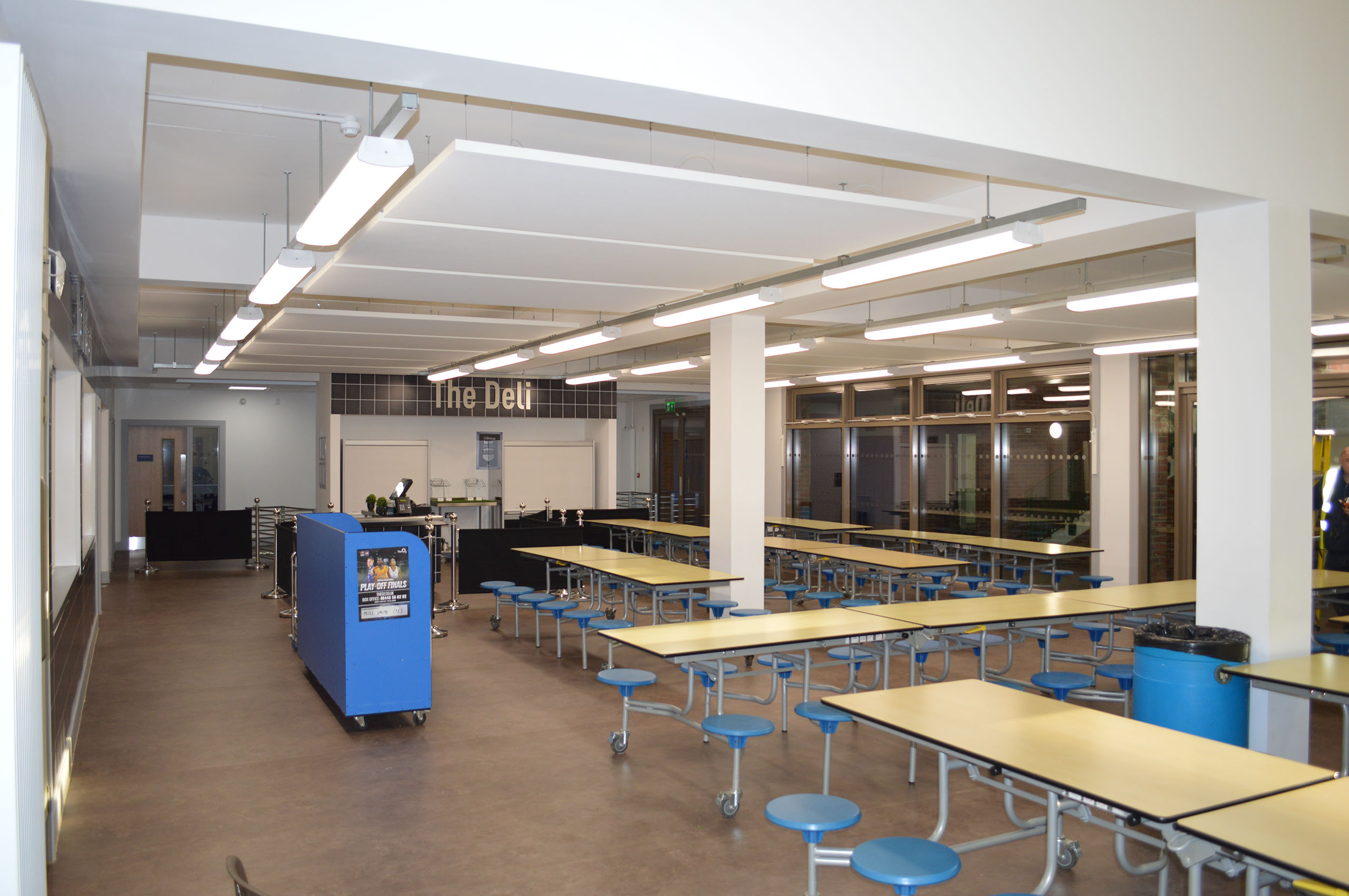 Girl sitting in her tent with a coffee