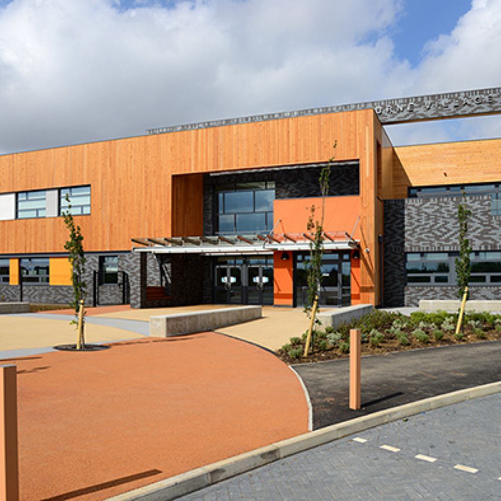 Girl sitting in her tent with a coffee