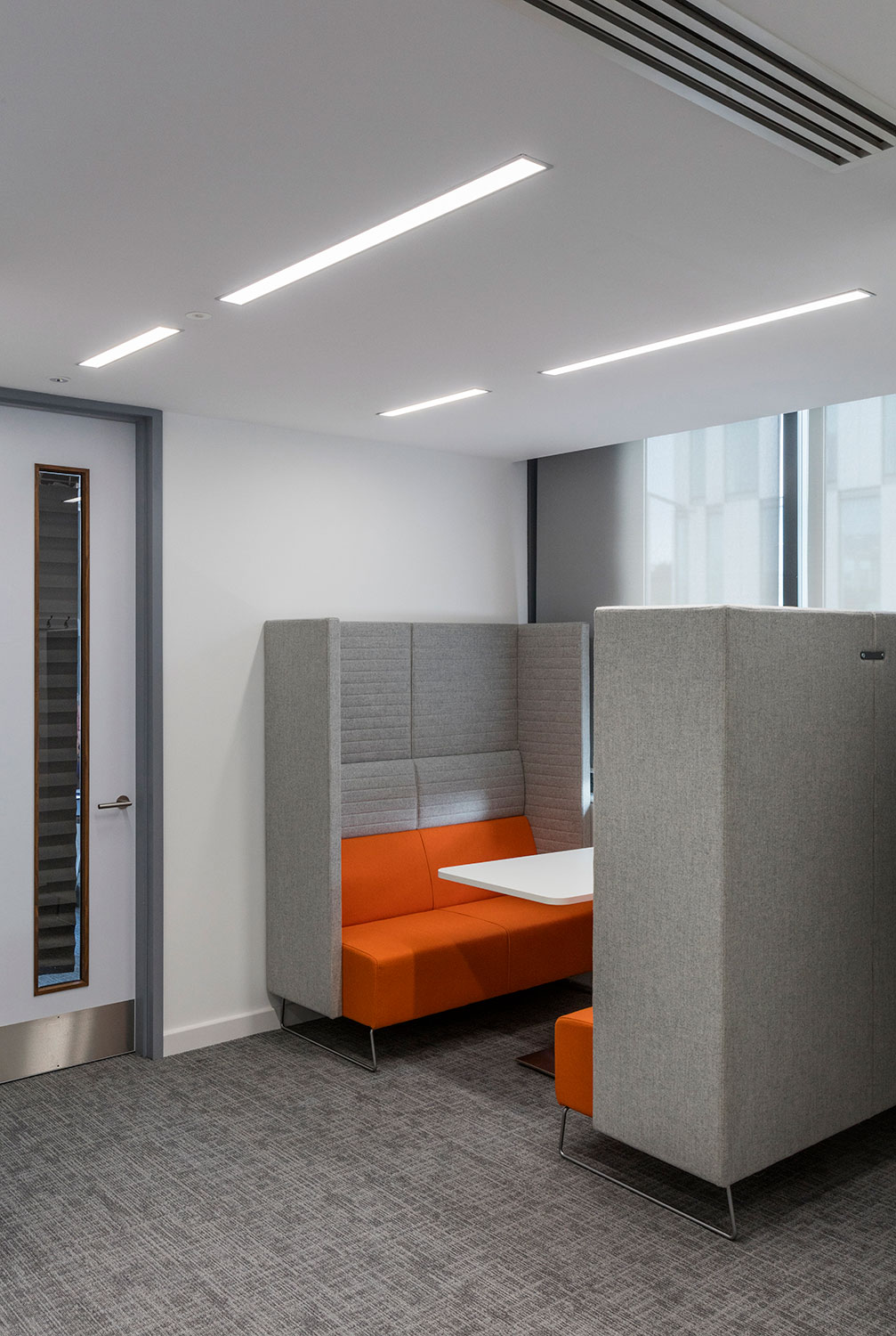 Girl sitting in her tent with a coffee