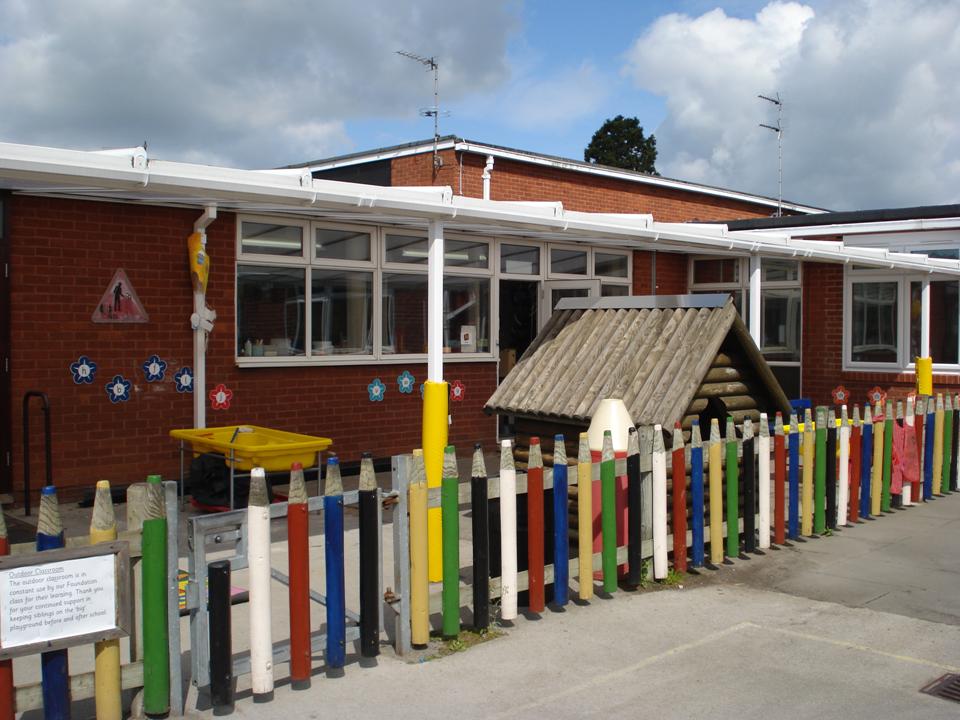 Girl sitting in her tent with a coffee