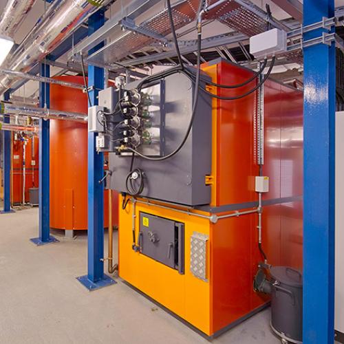 Girl sitting in her tent with a coffee